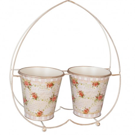 Podwójna osłonka metalowa z uchwytem w kształcie serca doskonała na parapet. Możesz zasadzić w niej dwa różne kwiaty i z niecierpliowścią oczekiwać efektu końcowego!